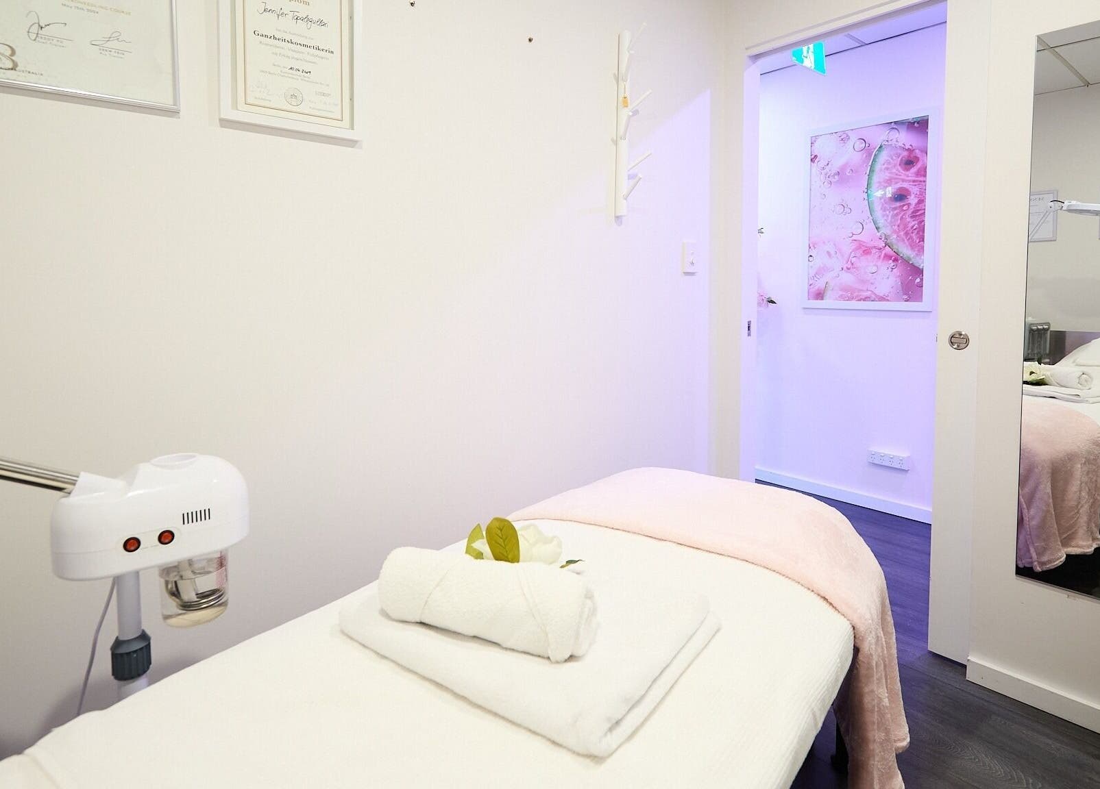 Calming treatment room at Beauty Circle in Sydney, New South Wales, AU with a massage table and modern decor.