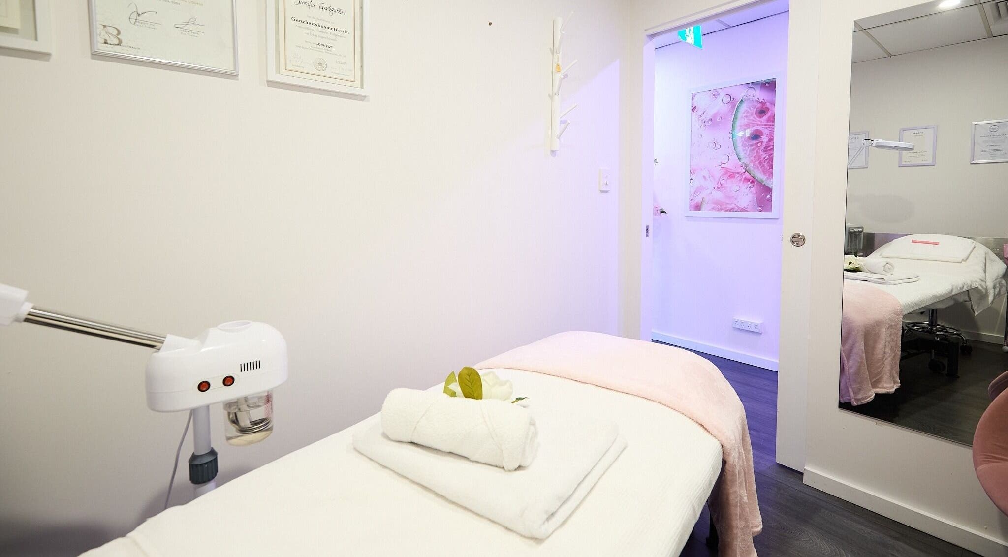 Calming treatment room at Beauty Circle in Sydney, New South Wales, AU with a massage table and modern decor.