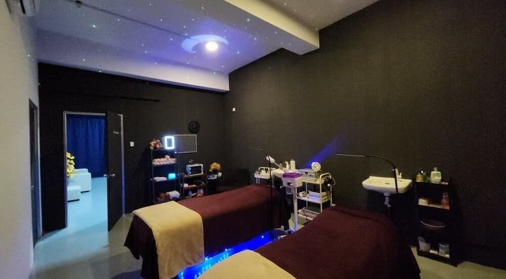 Luxsyr Spa in Johor Bahru, Johor, MY showcasing a tranquil treatment room with dual massage beds and calming lights.