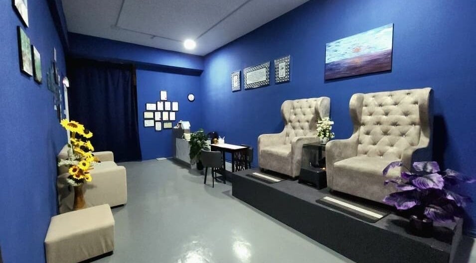 Relaxing spa seating at Luxsyr Spa in Johor Bahru, Johor, MY, with cozy chairs and soothing decor.