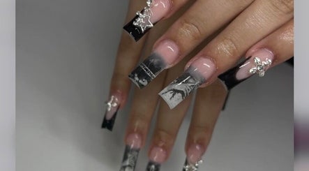 Stylish black and pink nail art with silver accents by Nailsbyshyy, Oshawa, Ontario, CA.