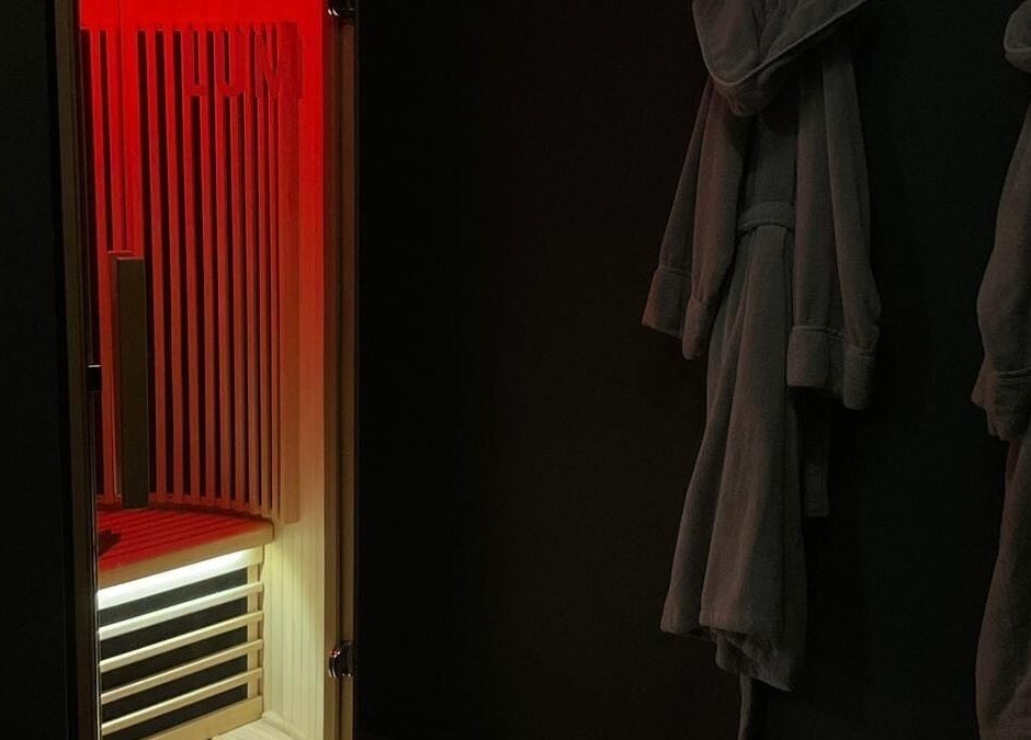 Cozy sauna interior at Wellness By Resolve in Birmingham, England, GB, offering relaxation in a luxurious setting.