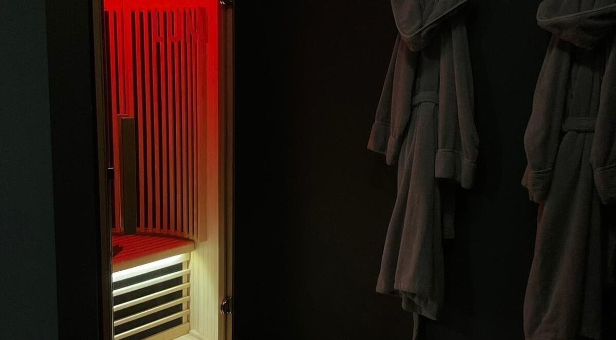 Cozy sauna interior at Wellness By Resolve in Birmingham, England, GB, offering relaxation in a luxurious setting.