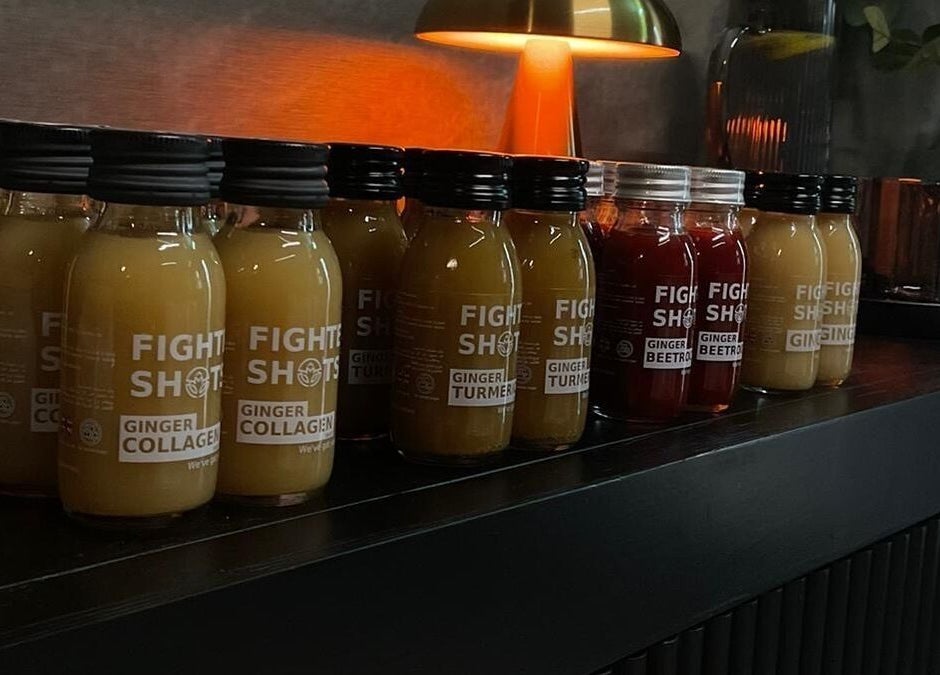 Assorted ginger wellness shots at Wellness By Resolve, Birmingham, England, GB.