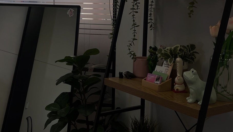 Chic decor setup at Gel X By Grace, Joondalup, Western Australia. Features plants and decorative figurines.