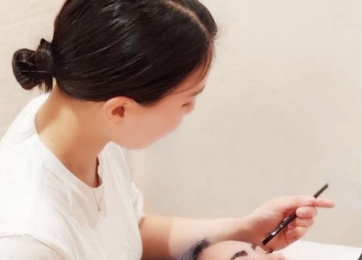 Technician crafting brows at Haruka Lashes and Brows Japanese Salon, Subiaco, Western Australia, AU.