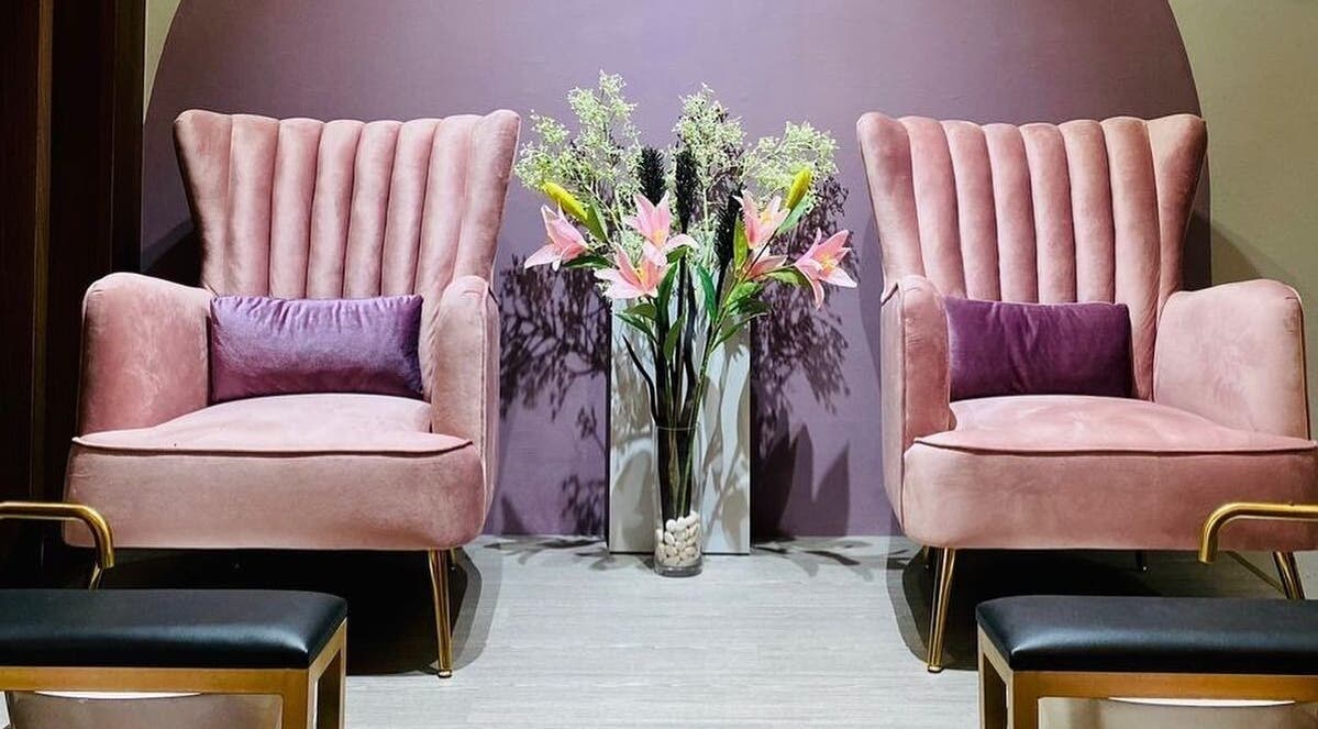 Elegant pink chairs and floral decor at Velvet Beauty & Spa, Shah Alam, Selangor, MY.