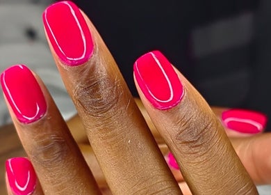 Vibrant pink manicure at Gnailbar, Johannesburg, Gauteng, ZA. Flawless nail art detail.