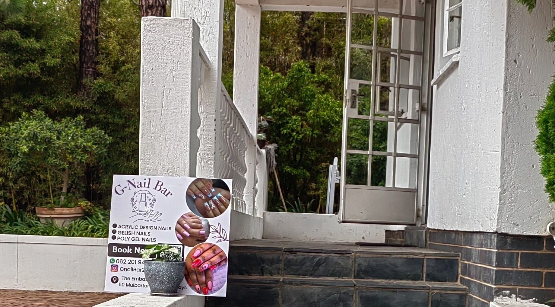 Outdoor view of Gnailbar front entrance in Pietermaritzburg, Kwazulu-Natal, ZA showcasing stylish nail designs.