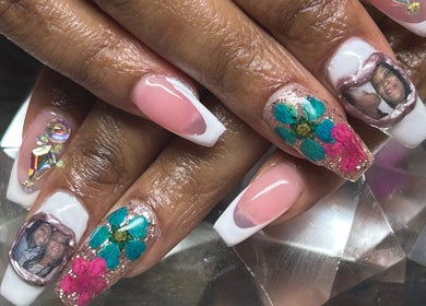 Intricate floral and photo nail art at PurpLust Nails in Hazelwood, Missouri, US.