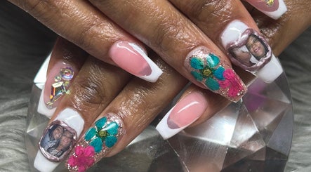 Intricate floral and photo nail art at PurpLust Nails in Hazelwood, Missouri, US.