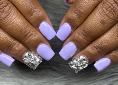 Lilac nails with rhinestones at PurpLust Nails in Hazelwood, Missouri, US.