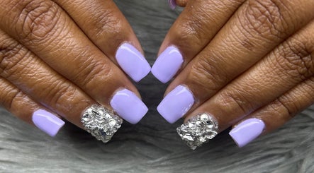 Lilac nails with rhinestones at PurpLust Nails in Hazelwood, Missouri, US.