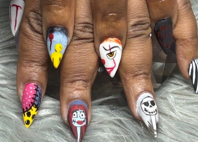 Unique Halloween nail art at PurpLust Nails, Hazelwood, Missouri, US showcasing intricate spooky designs.