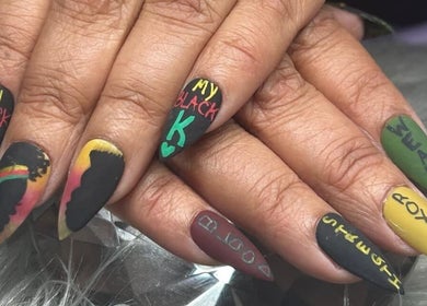Creative nail art at PurpLust Nails, Hazelwood, Missouri, US showcasing unique cultural designs.