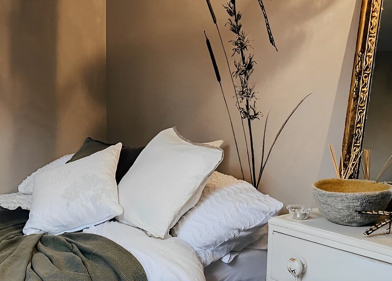 Relaxing bedroom at Manor Farm Spa - Wellness Lounge, Thorpe Audlin, England, GB with cozy bedding and decor.