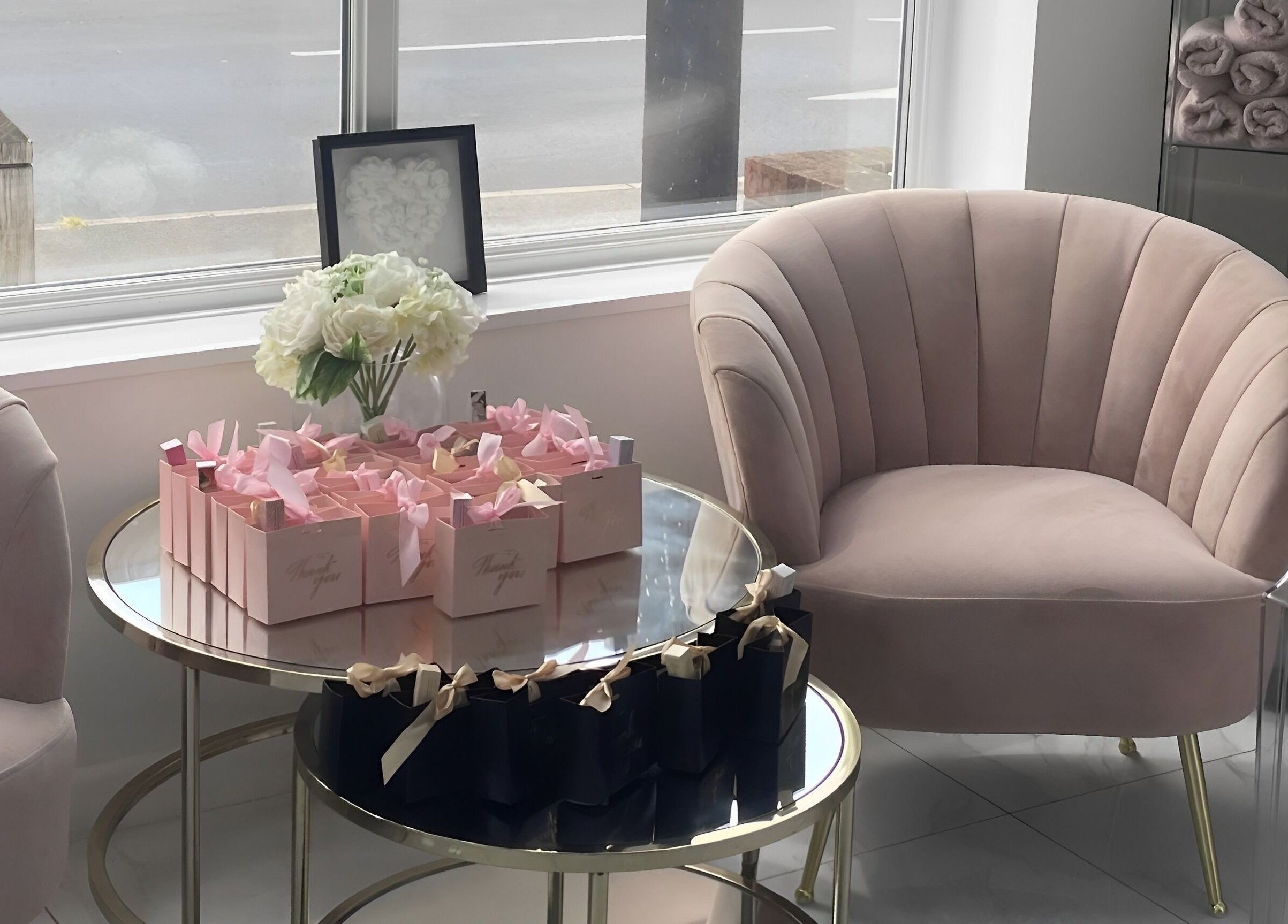 KC Butterflies lounge in Armthorpe, England, GB features plush seating and gift boxes for a serene ambiance.