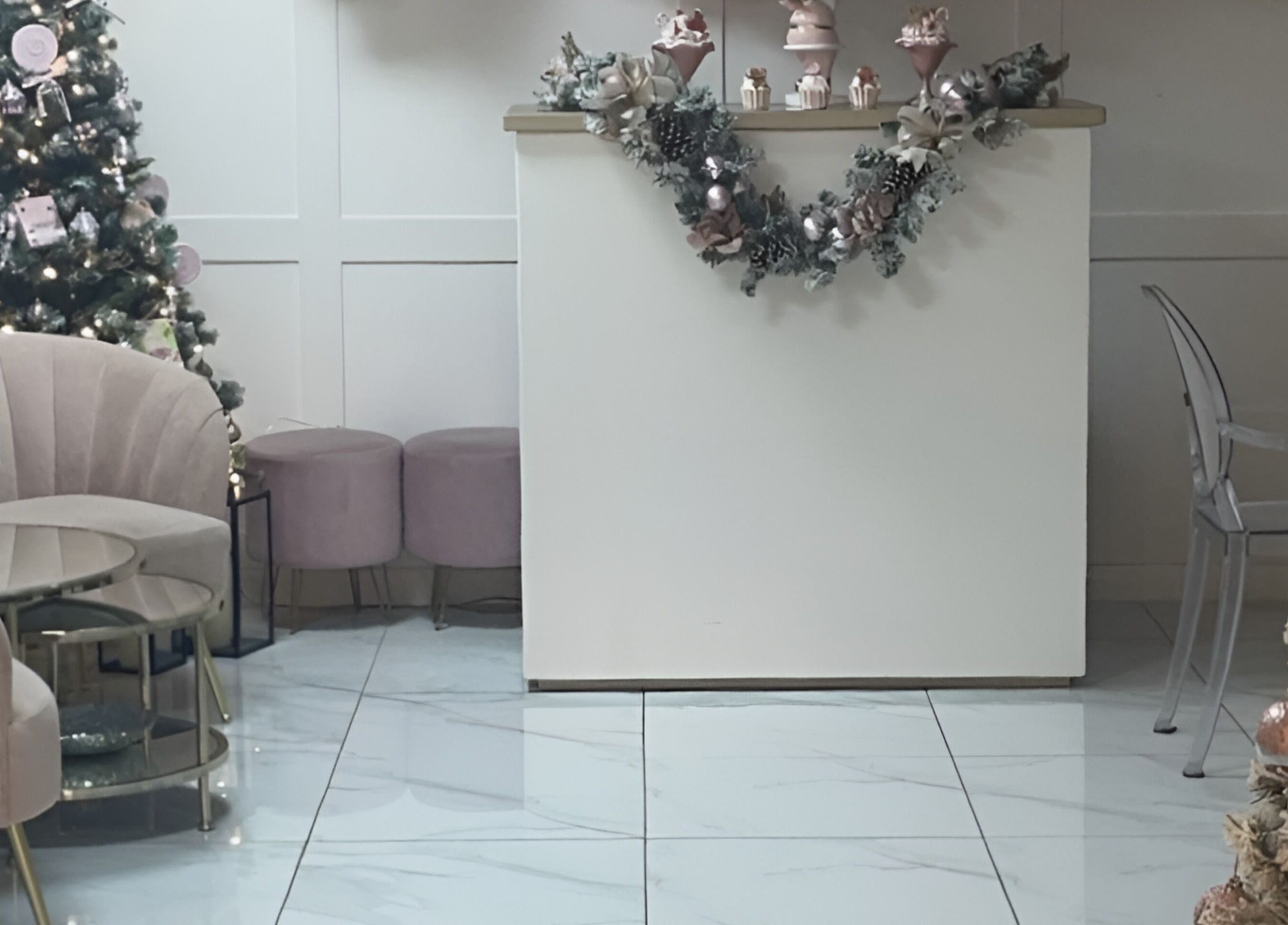 Stylish reception area at KC Butterflies, Armthorpe, England, GB, featuring festive and elegant decorations.