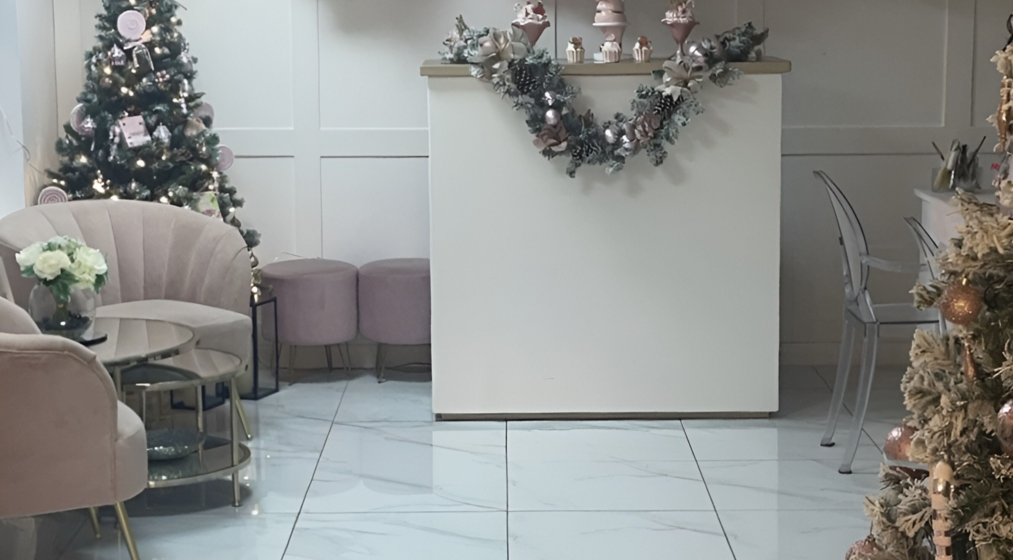 Stylish reception area at KC Butterflies, Armthorpe, England, GB, featuring festive and elegant decorations.