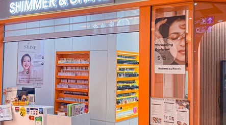Exterior of Shimmer & Shine at Northpoint, Singapore, showcasing beauty products and services.