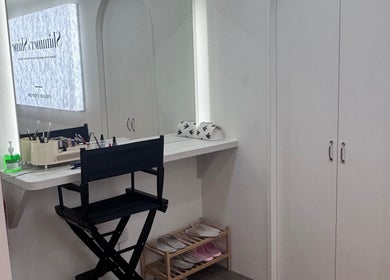 Makeup station at Shimmer and Shine, Kovan Heartland Mall, SG, with chair, products, and vanity mirror.