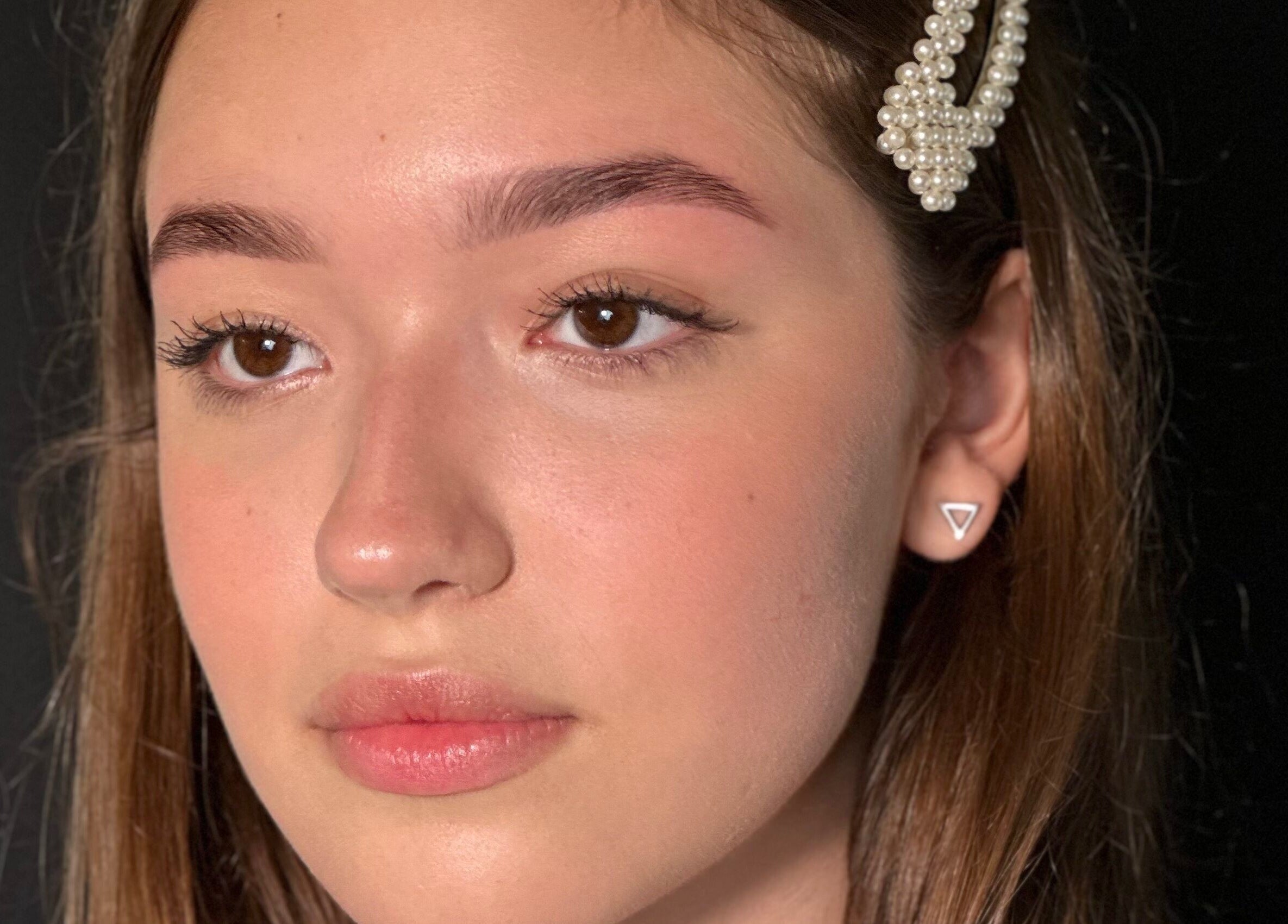 Natural beauty showcased with pearl accessory at Anastasia Shliakhtina, Limerick, County Limerick, IE.