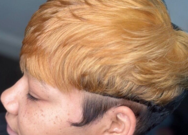 Close-up of stylish blonde haircut at A.Tanae, Dayton, Ohio, US.