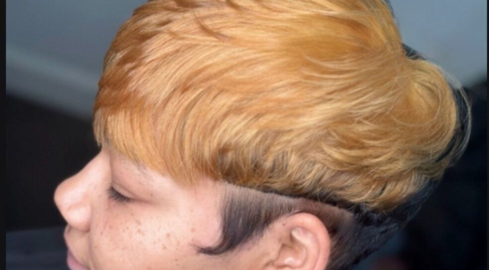 Close-up of stylish blonde haircut at A.Tanae, Dayton, Ohio, US.