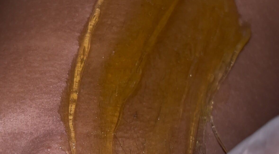 Smooth golden waxing session at Eternal Serenity Beauty Spa, Nassau, New Providence, BS for flawless skin.