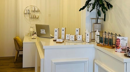 Interior of TOV Organic Salon in Tas-sliema, MT showcasing natural beauty products and elegant decor.