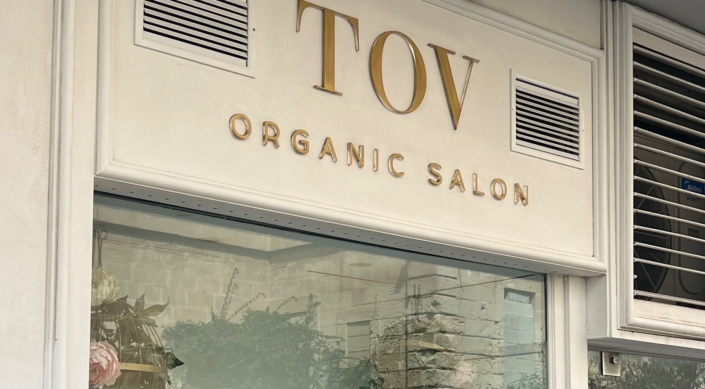TOV Organic Salon's chic exterior signage in Tas-sliema, MT showcases its organic beauty focus.