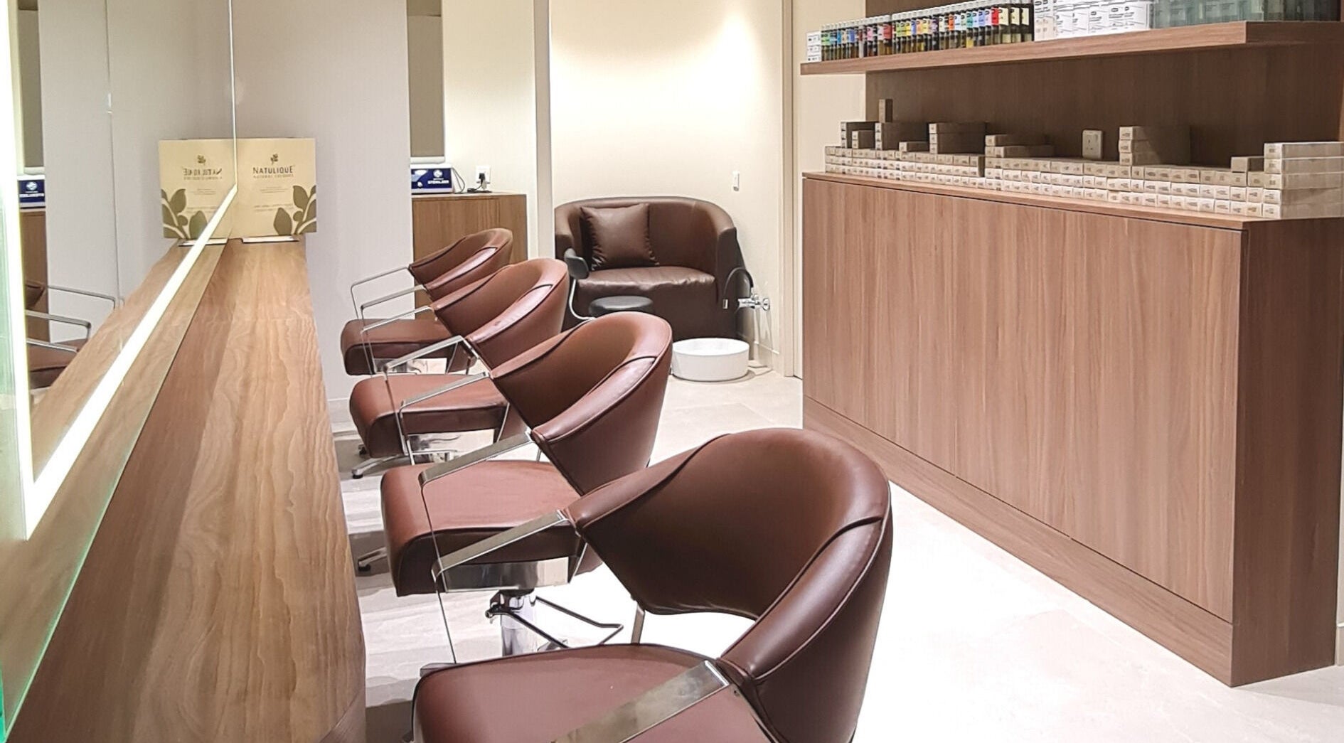 Elegant salon chairs and decor at Sammy Green Dubai Hills, Dubai, Dubai, AE, showcasing modern aesthetics.