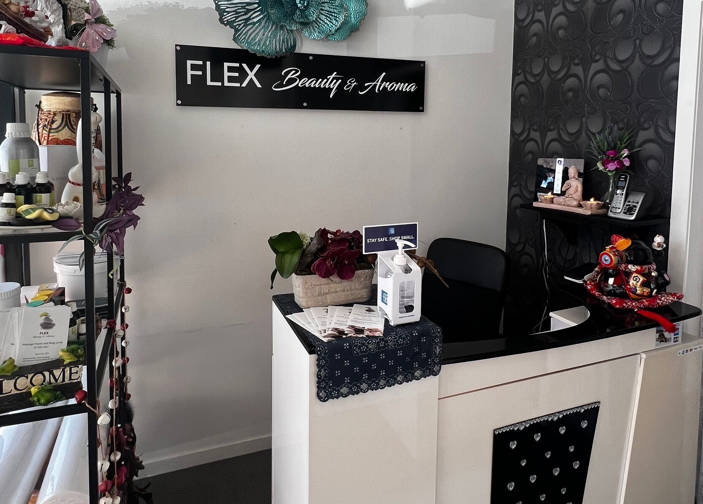 Reception at Flex Beauty and Aroma, Bundall, Queensland, AU, showcasing elegant decor and wellness products.