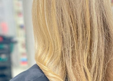 Blonde hair styled at AM Beauty Hair Salon in Gympie, Queensland, AU. Sleek, professional finish.