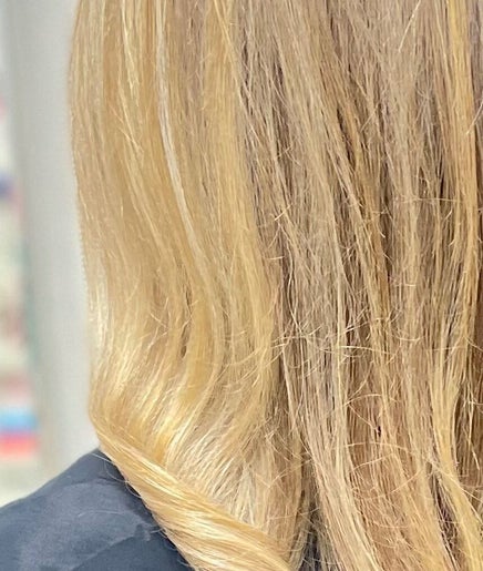 Blonde hair styled at AM Beauty Hair Salon in Gympie, Queensland, AU. Sleek, professional finish.