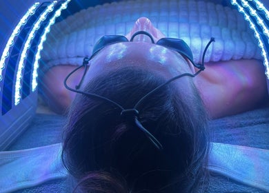 Relaxing LED therapy session at Glow by Daisy, Crabtree, England, GB enhances skin rejuvenation.