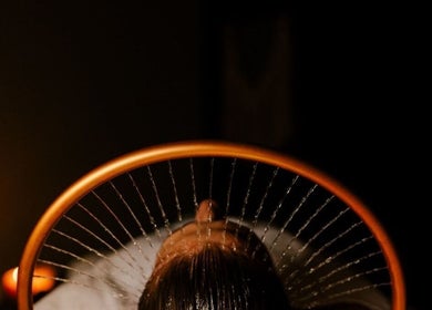 Relaxing spa experience under warm light at Being | Bryanston, Sandton, Gauteng, ZA.