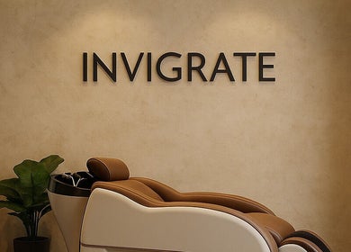 Chic salon chair beside a calming plant at Being | Fourways in Sandton, Gauteng, ZA.
