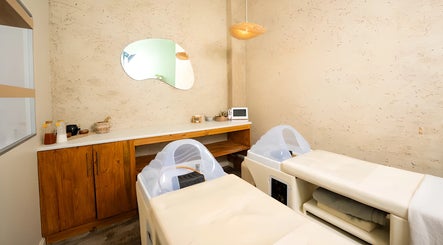 Tranquil treatment room at being | Morningside, Sandton, Gauteng, ZA with plush massage tables.