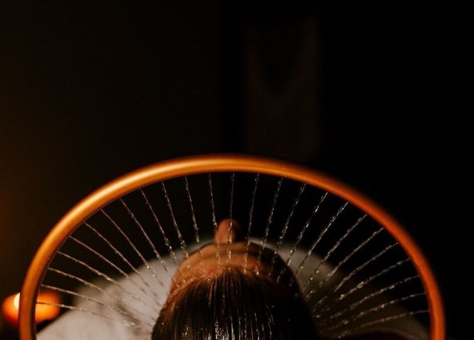 Serene head massage at being | Morningside, Sandton, Gauteng, ZA, with ambient lighting.