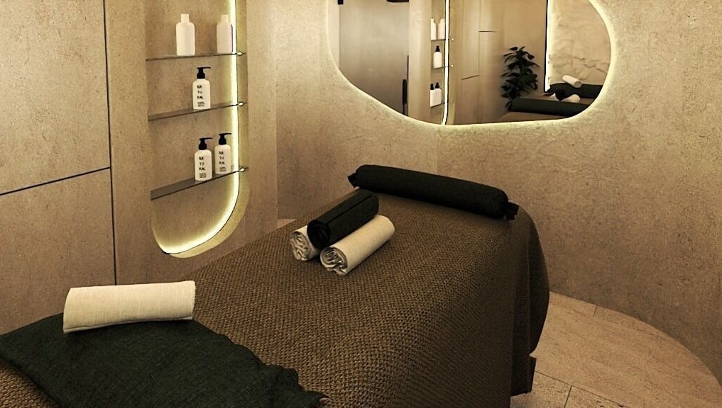 Tranquil massage room at being | Bryanston in Sandton, Gauteng, ZA with modern decor and soft lighting.