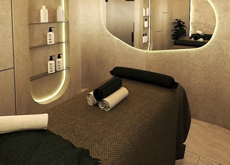 Tranquil massage room at being | Bryanston in Sandton, Gauteng, ZA with modern decor and soft lighting.