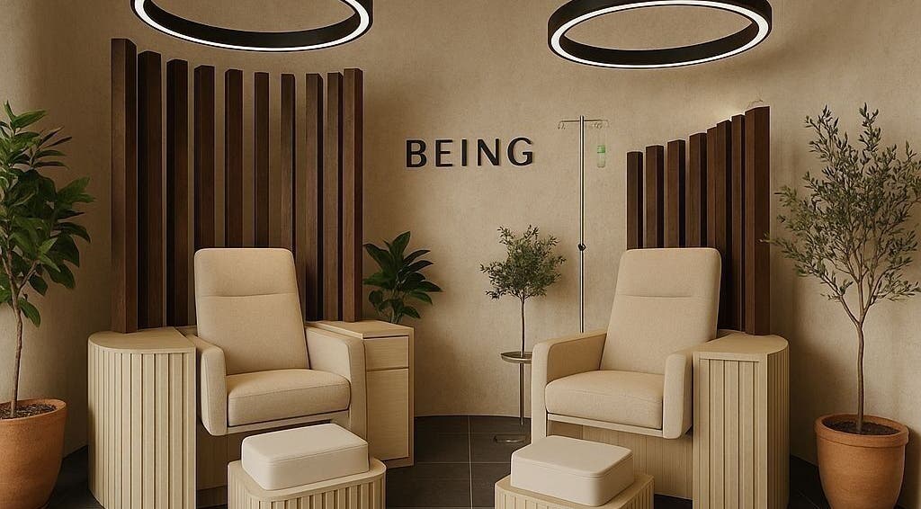 Luxurious seating area at being | Bryanston in Sandton, Gauteng, ZA accentuated by elegant decor and soft lighting.