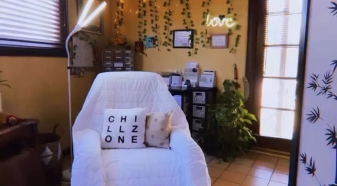 Relaxing corner at Jewels Lashes in Glendale, California, US with comfy chair and cozy decor.