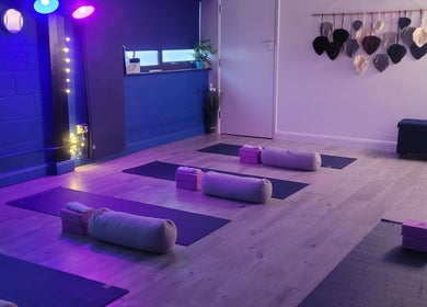 Yoga mats and props in a serene studio at Lauren Louise Wellness, Biggleswade, England, GB.
