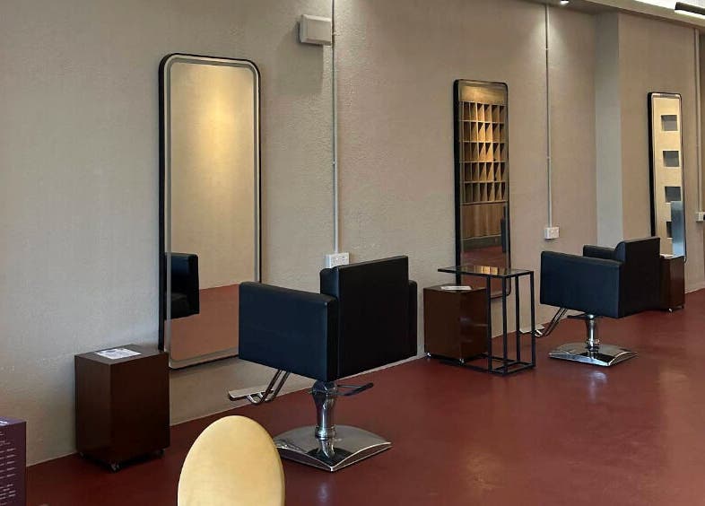 Modern salon chairs and mirrors at Hairkunst 13 Salon in Shah Alam, Selangor, MY.