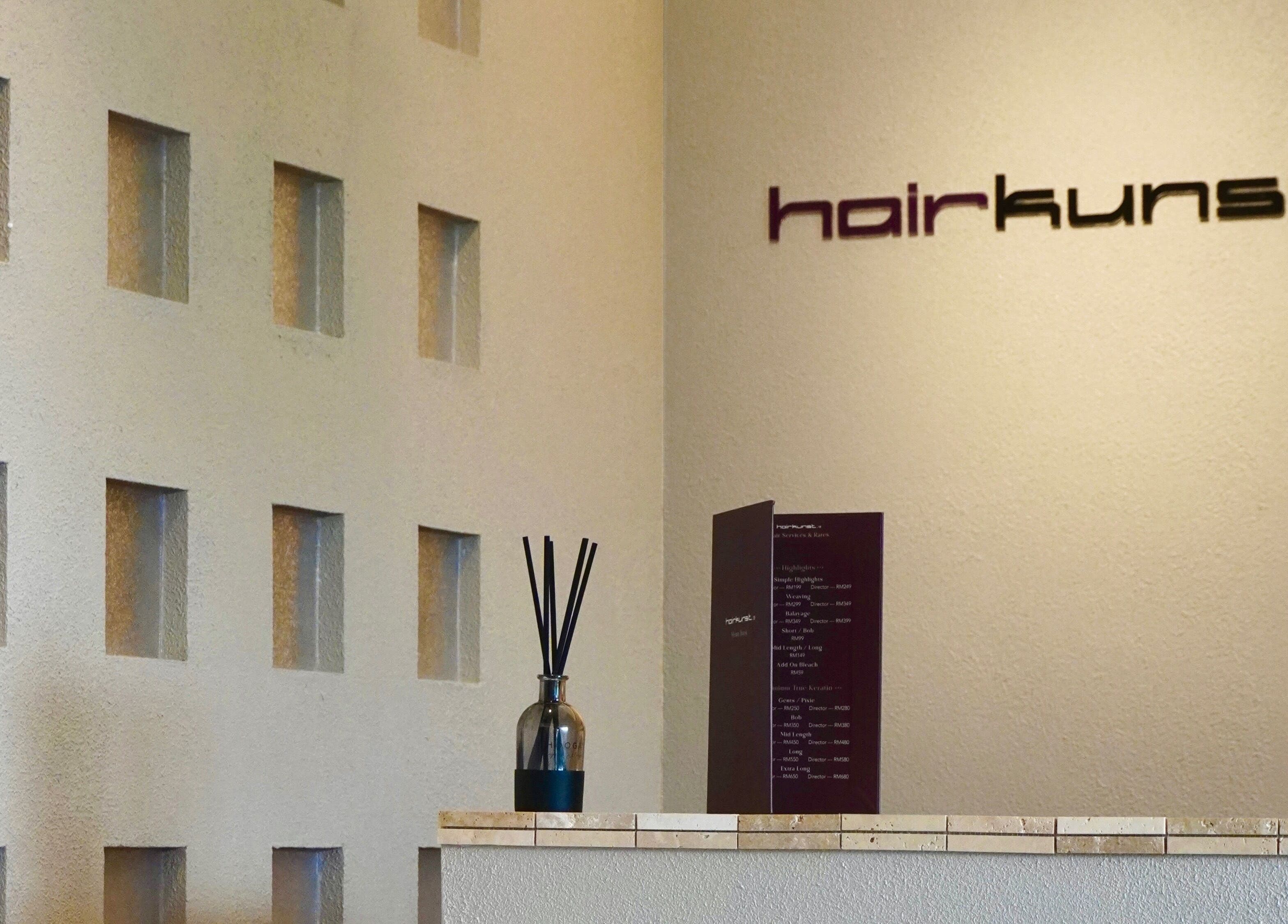 Modern reception area of Hairkunst 13 Salon in Shah Alam, Selangor, MY with decorative accents.