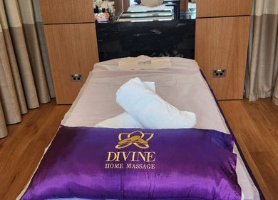 Luxury massage setup at Divine Home Massage, City of Sydney, AU with plush purple pillow.