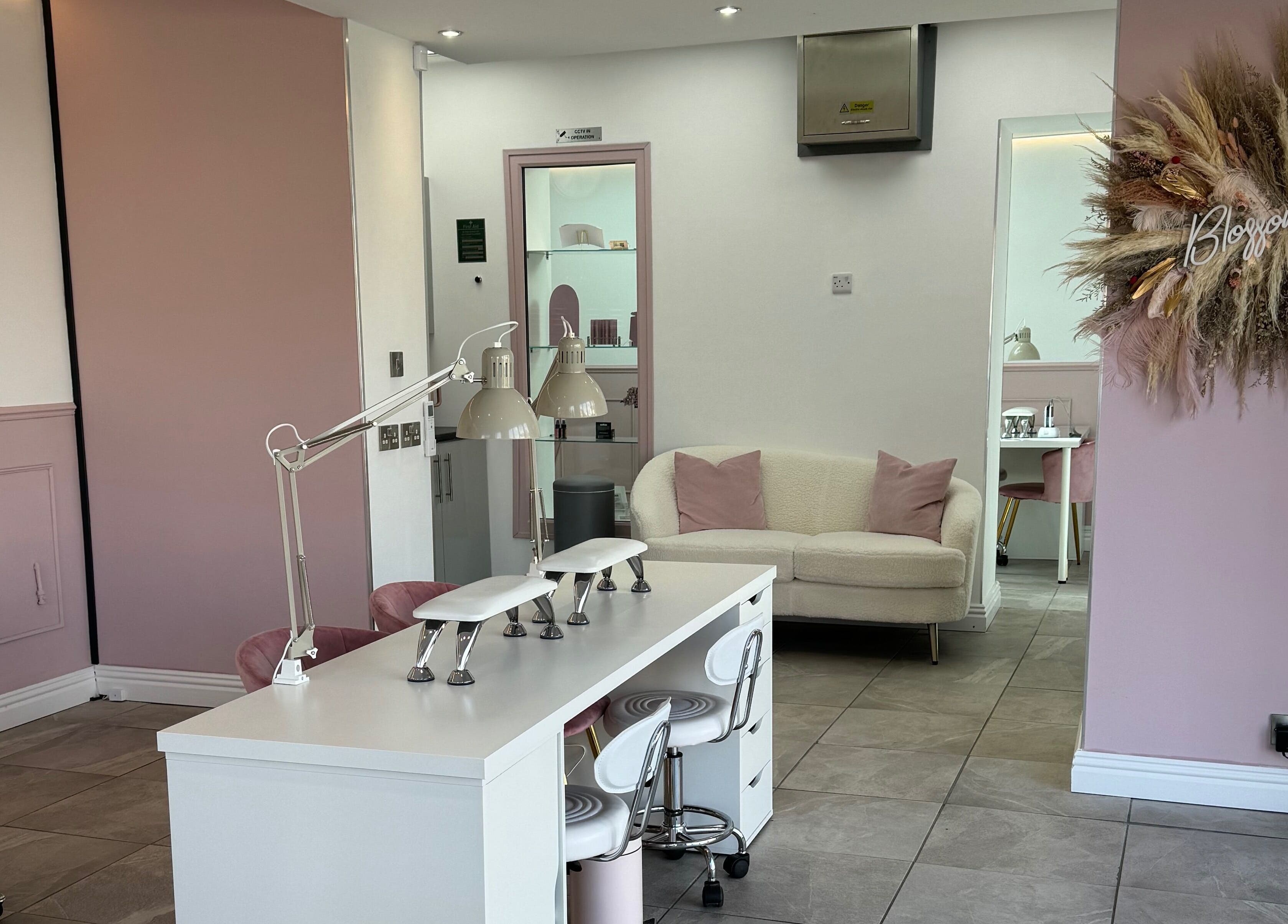 Chic and modern interior of Blossom Salon, Shrewsbury, England, GB, featuring elegant decor and welcoming space.