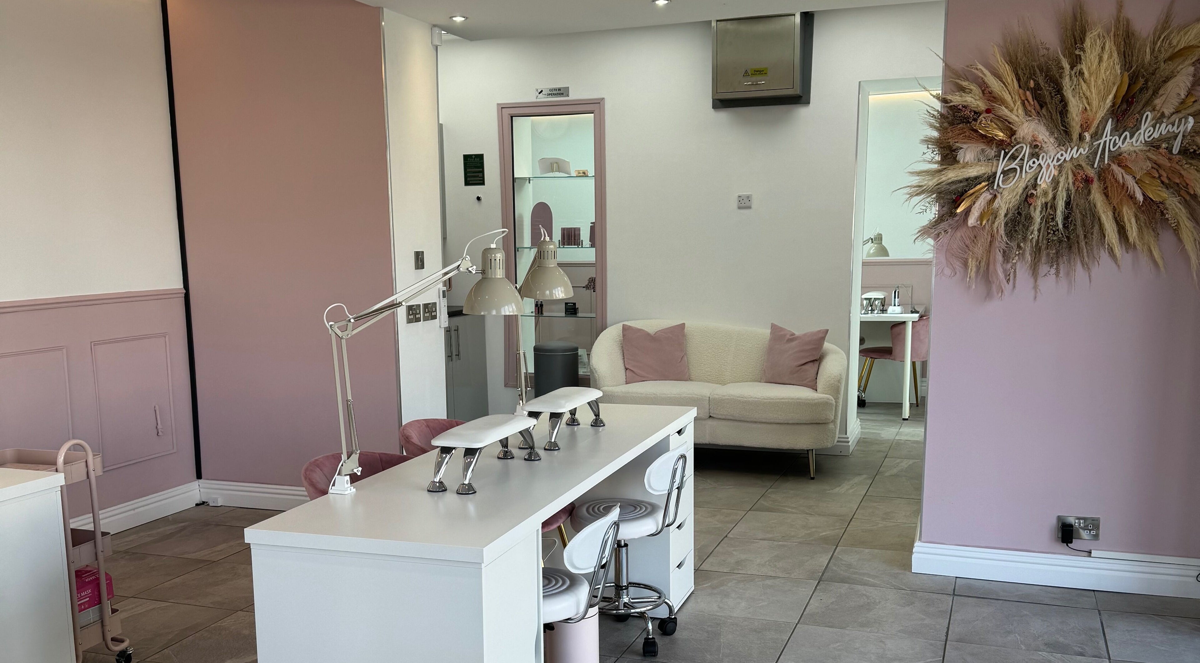 Chic and modern interior of Blossom Salon, Shrewsbury, England, GB, featuring elegant decor and welcoming space.